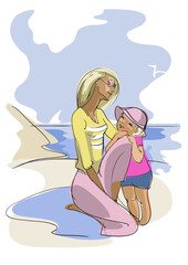 young woman and her child on a  beach