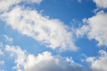 Naklejka na ściany i meble Light clouds on a background of blue sky.