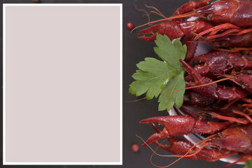 Delicious boiled crayfish close-up on a stone plate with lemon and parsley, free space for your text, collages, in Black background,