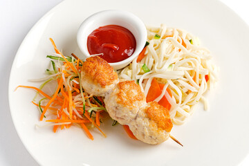 chicken kebab with pasta and sauce