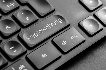 graue "Kryptowährung" Taste auf einer dunklen Tastatur