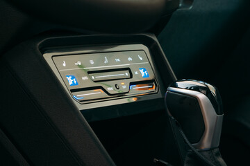 New modern sensor car climate control panel or console of air conditioner, sensor buttons, close up.