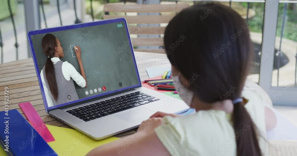 Sticker Caucasian schoolgirl in face mask using laptop on video call with female teacher