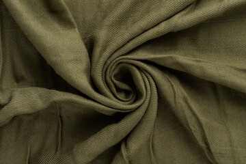 Crumpled linen cloth texture. Wrinkled textile. Green