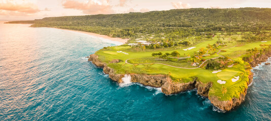 Aerial view of Cabo Tutinferno cliffs and Playa Grande beach with a beautiful golf course, Río San Juan, María Trinidad Sánchez, Dominican Republic.