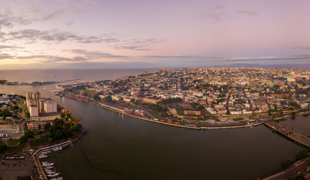 Panoramic aerial view of the colonial district of Santo Domingo and the city center with Ozama fort and the port in foreground, Santo Domingo, Dominican Republic.