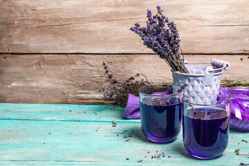 Lavender tonic drink on wooden table
