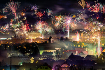 New Years Eve in Kirchzarten a small town close to Freiburg in the Black Forest Germany - obrazy, fototapety, plakaty