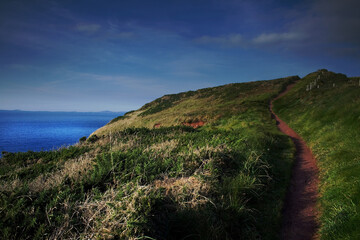 dramatic landscape photos of the British coast.
