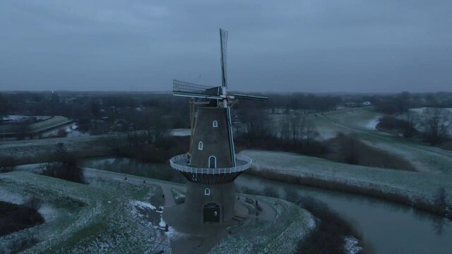 Aerial View Of Nooit Volmaakt Flour Mill On The Bank Of Linge River In Wintertime At Gorinchem, Netherlands.