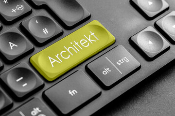 gelbe Architekt Taste auf einer dunklen Tastatur