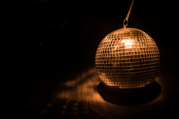 Colorful disco mirror ball lights night club background. Party lights disco ball. Selective focus