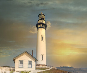 Pigeon Point lighthouse against the backdrop of a beautiful sky and ocean with waves, a great landscape of the Pacific coast in California