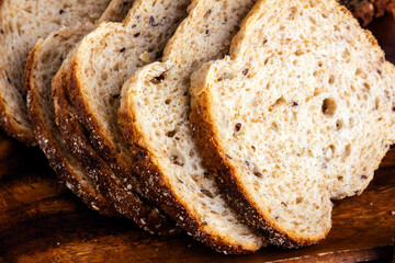 Sliced wheat bread baked with seeds.