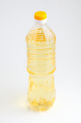 Bottle with vegetable oil on a white background