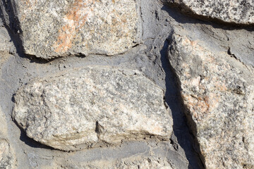 decorative masonry, formed from stones of various sizes and shapes