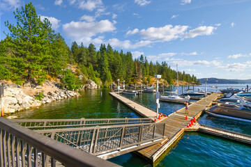Boats, wave runners and watercraft docked at a marina along Tubbs Hill on Lake Coeur d'Alene in...