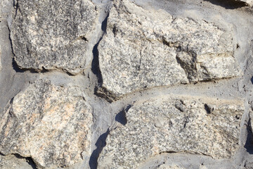 four different stones are poured into decorative masonry