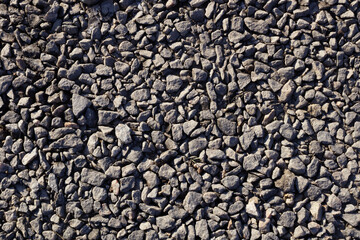 small gray stones completely cover the ground