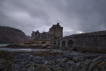 Fototapeta na wymiar Eilean Donan Castle, Scotland, Uk, Highlands. Image after a storm when the clouds opened.