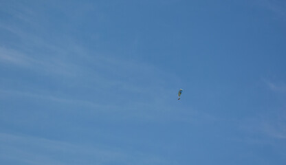 Naklejka na ściany i meble A glider in the sky, controlled by someone