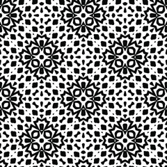  Geometric vector pattern with triangular elements. Seamless abstract ornament for wallpapers and backgrounds. Black and white colors.