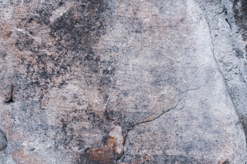 Antique wall cracks, ancient building facade close-up, textured surface exposed to atmosphere water outdoors, vintage background