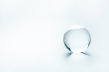 Clear enlighted glass sphere as an idea concept. Minimalistic backdrop for text copy and universal concept utilization