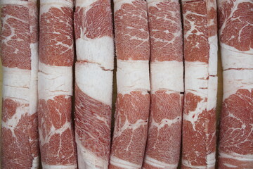 Frozen Beef Brisket Meat that is sliced and rolled up 