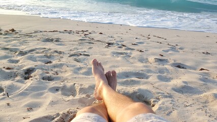 feet on the beach