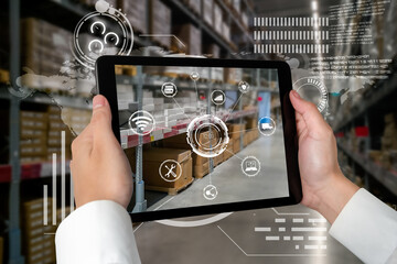 Smart warehouse management system using augmented reality technology to identify package picking and delivery . Future concept of supply chain and logistic business .