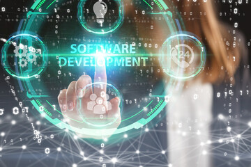 Business, Technology, Internet and network concept. Young businessman working on a virtual screen of the future and sees the inscription: Software development