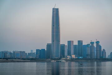 Wuhan skyline and Yangtze river with supertall skyscraper under construction in 2021 in Hubei China