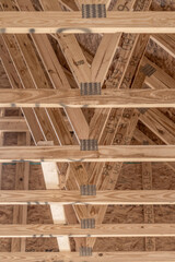 Close up of galvanized metal connector plates, rafter for wood, trusses, holding up beams for a new...
