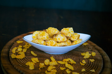 Homemade Cornflake cookies on a wooden background.