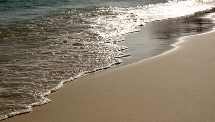 sea water on sand close up