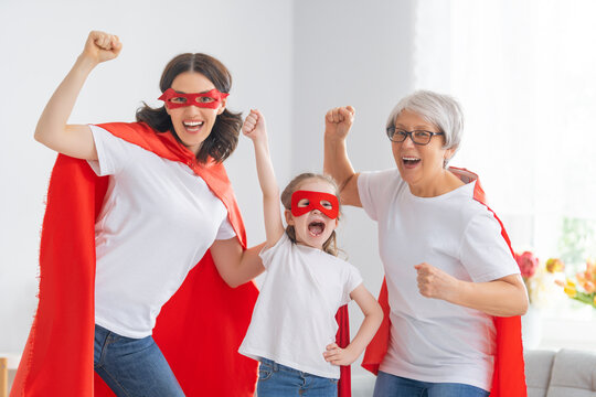 Family in Superhero costumes