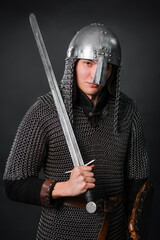 Portrait of a medieval warrior of the late Viking era and the beginning of the Crusades. Knight in...