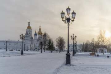 View of the Tobolsk Kremlin (Russia) at sunrise in winter. From the very cold weather, morning fog...