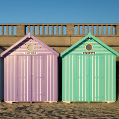 Close-up of two vintage beach huts in France
