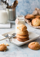 Freshly baked homemade crunchy cream cheese cookies. A delicious treat for gourmets. Biscuits on a grey concrete background. Biscuit.  Biscuits texture