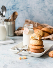 Freshly baked homemade crunchy cream cheese cookies. A delicious treat for gourmets. Biscuits on a grey concrete background. Biscuit.  Biscuits texture