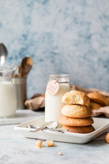 Freshly baked homemade crunchy cream cheese cookies. A delicious treat for gourmets. Biscuits on a grey concrete background. Biscuit.  Biscuits texture