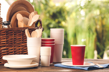 Eco tableware on table against blurred background