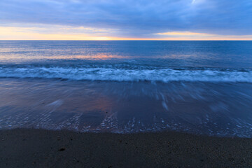 海　砂浜　夕日　冬の日本海