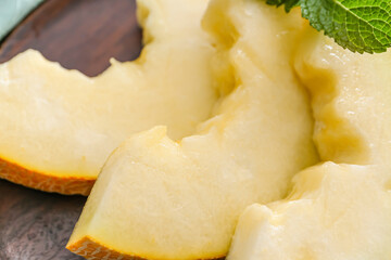 Plate with sweet cut melon, closeup