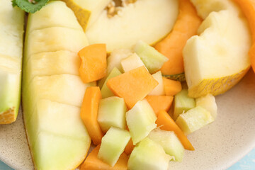 Plate with sweet cut melon, closeup