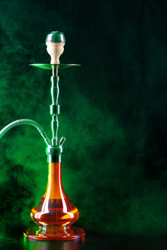 Modern Hookah With Smoke In Dark Club Light