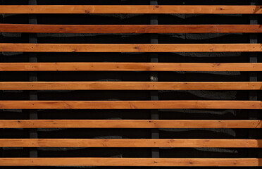 wooden planks on black wall background