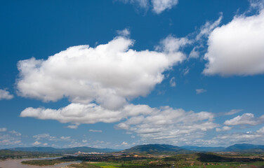 The sky has clouds and the Mekong River.sky and cloud.white clouds.Village near the river.Border river.River border Thailand and Laos. Chiang Saen,Chiang Rai.